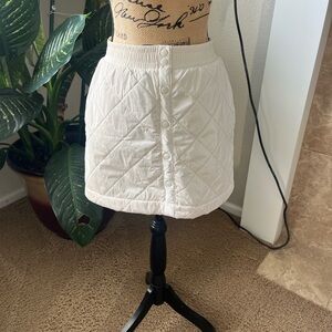 NWOT Atheleta Girl. Design in white quilted skirt is a stylish